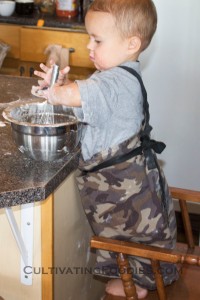 Little Chef stirring pancake batter